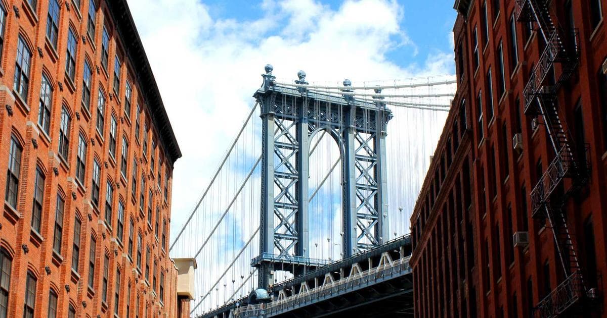 Smart factory floor showing IoT sensors, robotic automation, and digital twin visualization dashboard